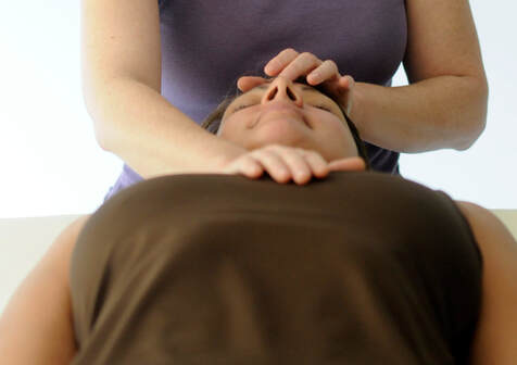 Picture of person receiving Reiki